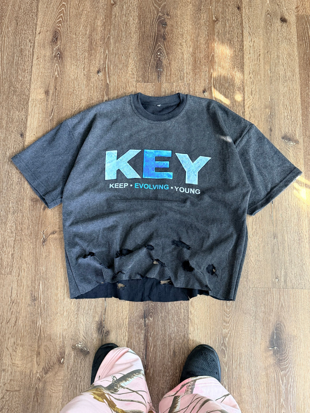 Black Keep • evolving • young tee