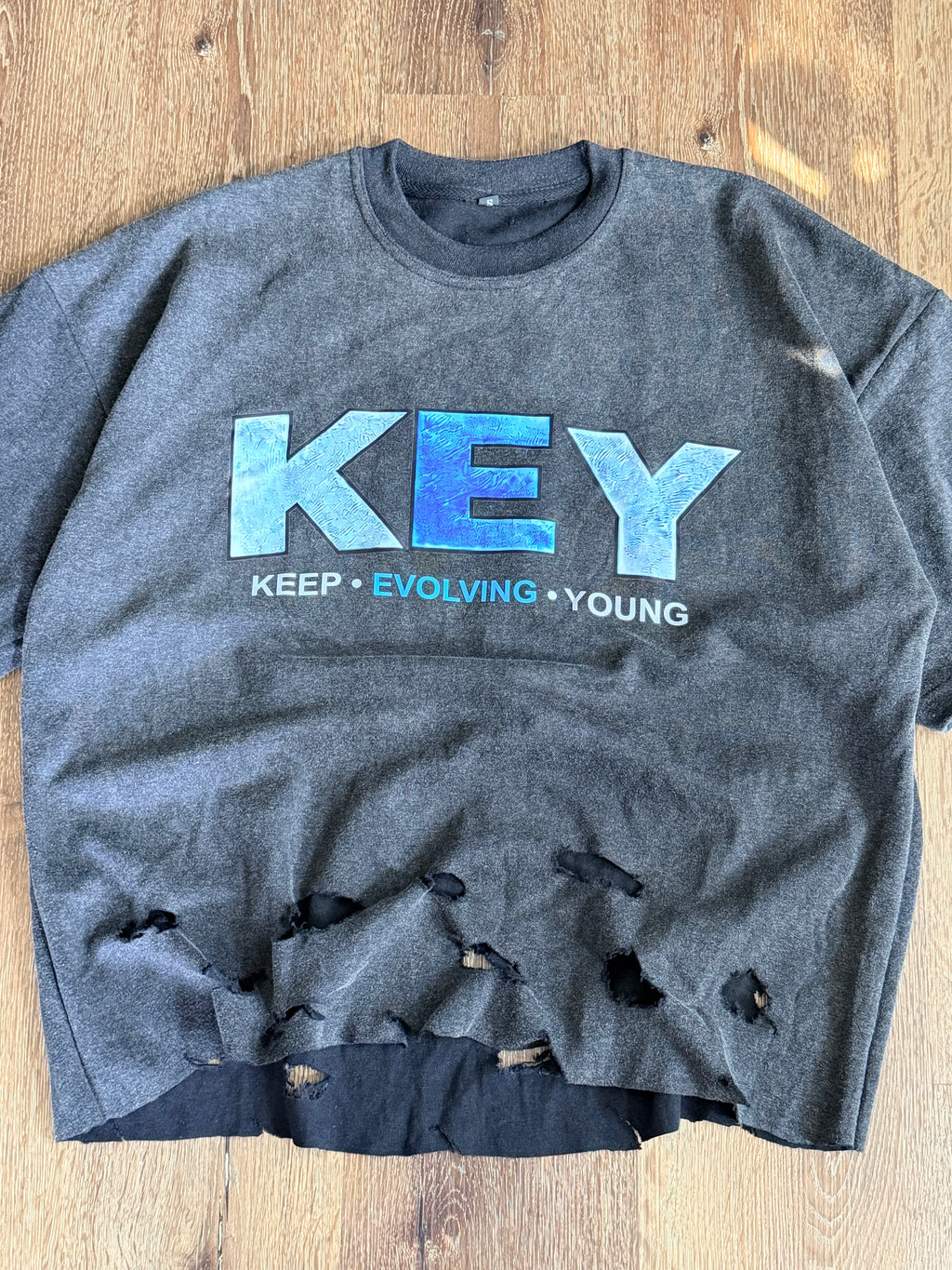 Black Keep • evolving • young tee